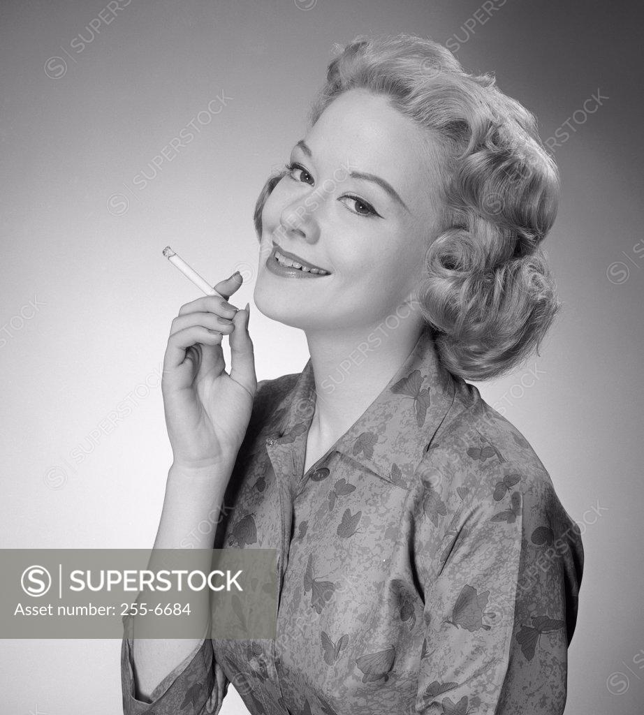 Stock Photo: 255-6684 Portrait of woman smoking