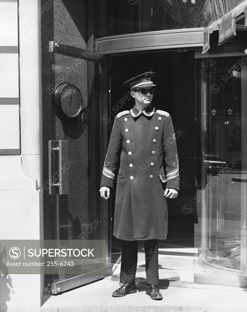 Stock Photo: 255-6743 Doorman standing in a doorway