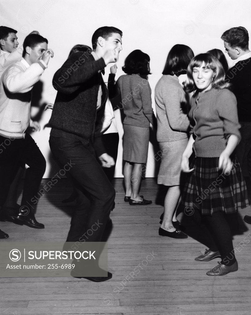 Stock Photo: 255-6989 Group of teenagers dancing in a party