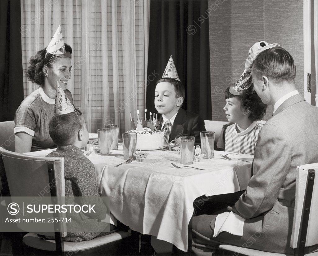 Stock Photo: 255-714 Parents and their children celebrating birthday