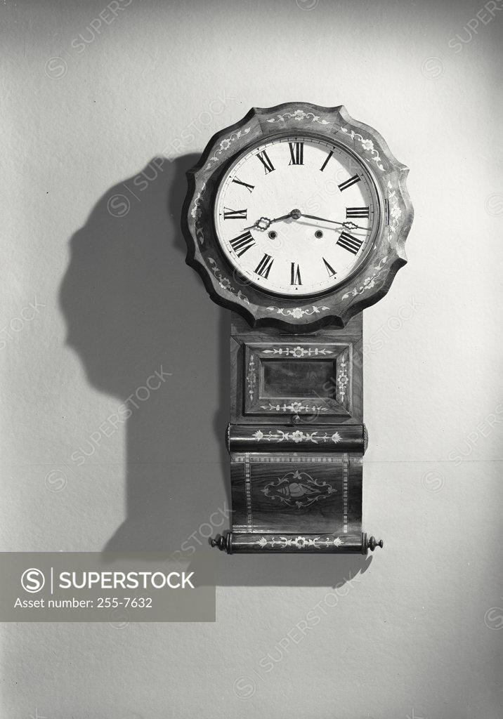 Stock Photo: 255-7632 Close-up of clock hanging on wall