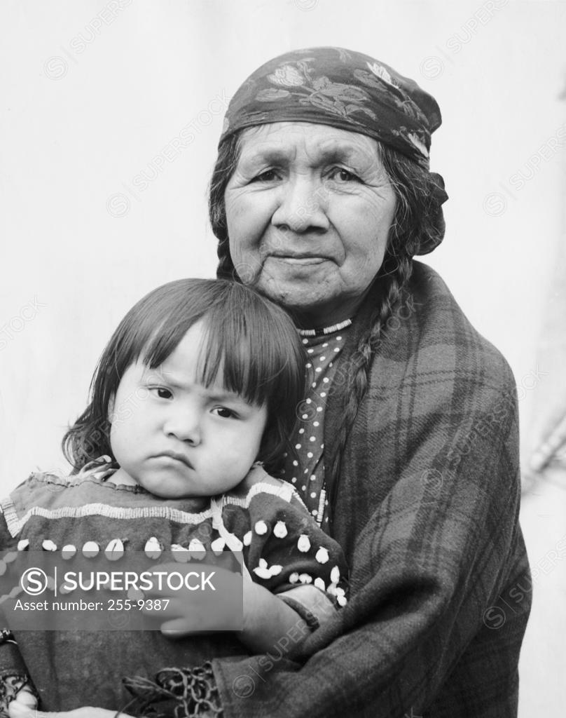 Stock Photo: 255-9387 USA, Oregon, portrait of Umatilla woman sitting with granddaughter