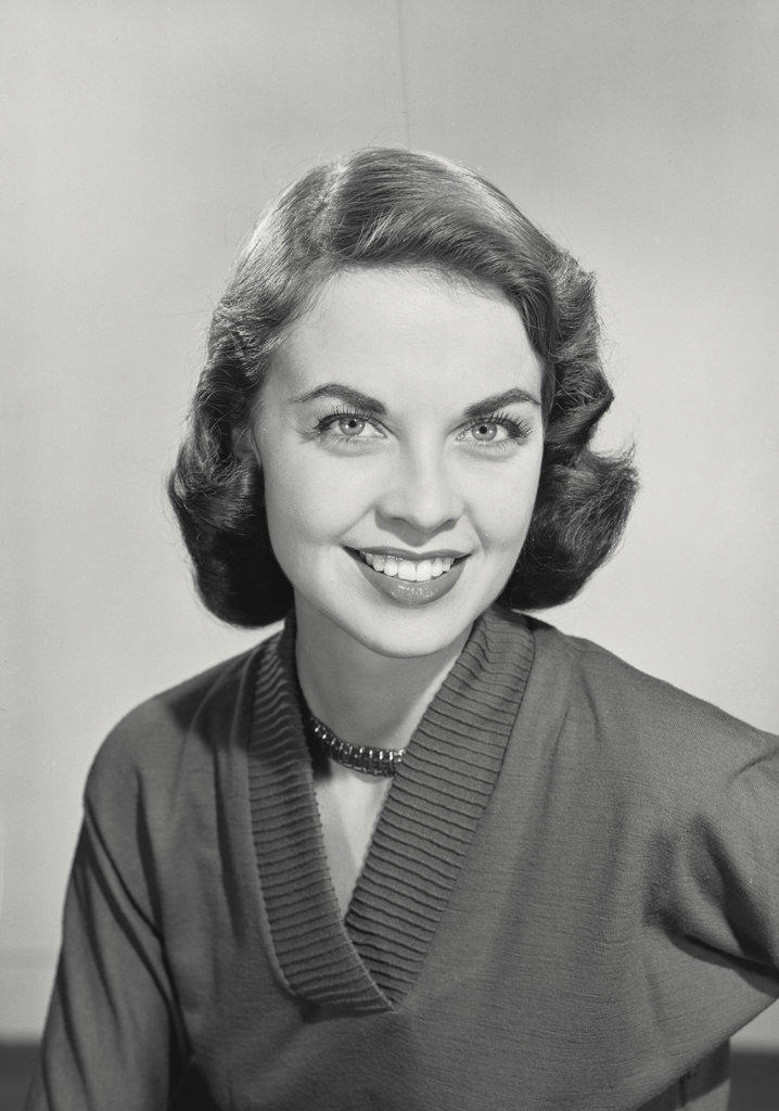 Brunette woman smiling at camera