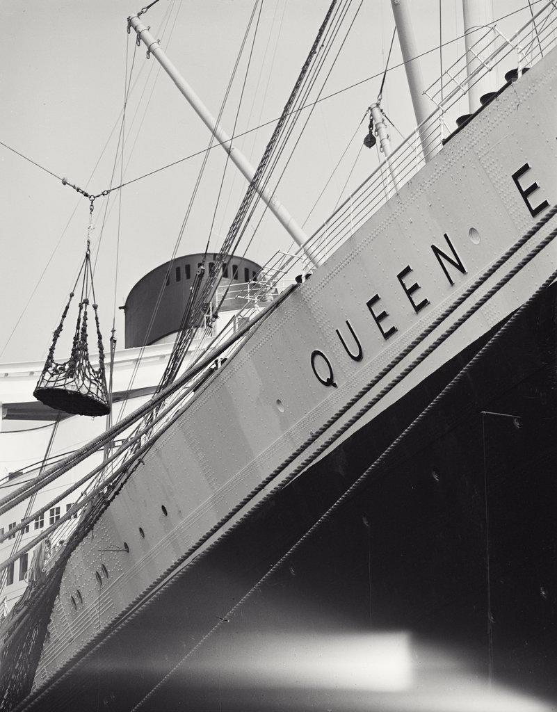 Queen Elizabeth ship being loaded on North River