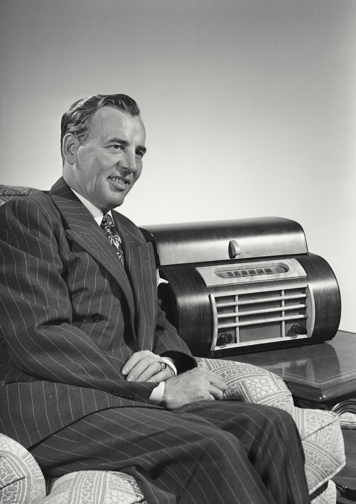 Close-up of a mature man listening to the radio