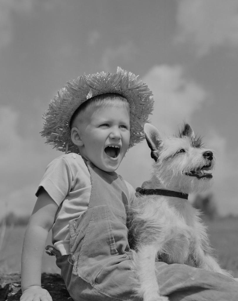 Boy with terrier dog