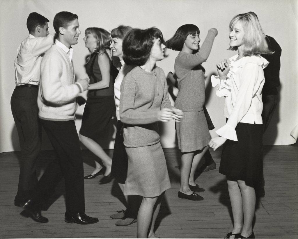 Group of teenagers dancing in a party