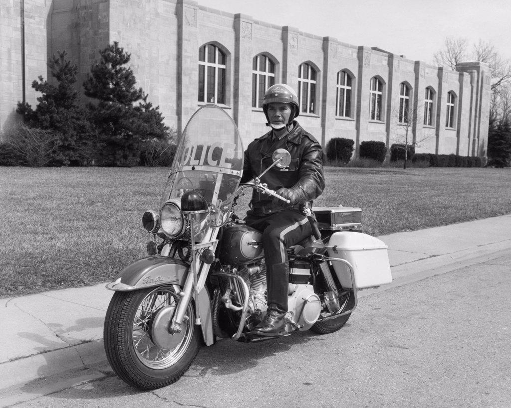Policeman riding a motorcycle