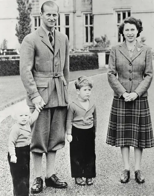 Vintage photograph. Royal Family - Queen Elizabeth II and Duke of Edinburgh with their children, Prince Charles and Princess Anne