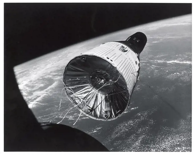 Satellite orbiting in space, Gemini VII Spacecraft