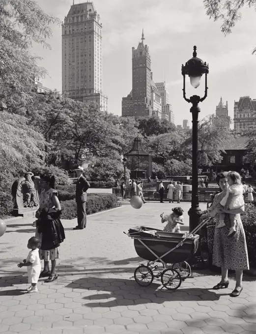 Vintage photograph. Women with children and stroller in Central Park, New York City