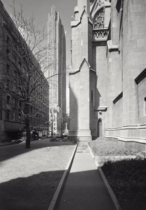 Vintage photograph. RCA Building as seen from 49th street with St Patrick Church in foreground