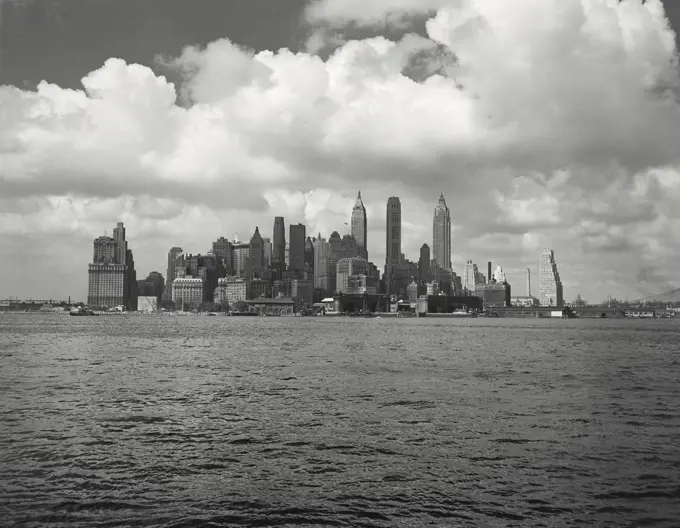 Vintage photograph. view of Manhattan skyline with clouds behind