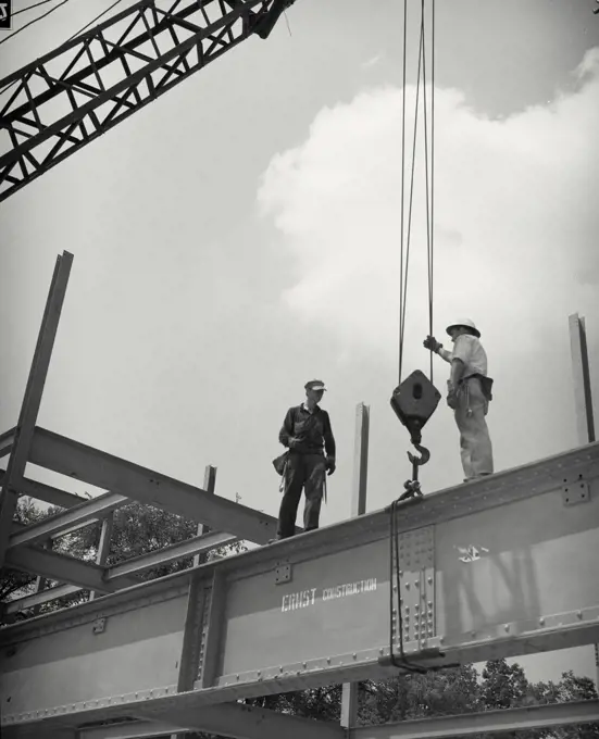 Vintage photograph. erecting steel frame