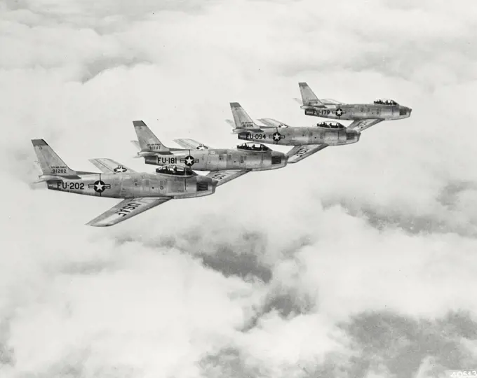 Vintage photograph. Formation of North American F-86 Sabres of the 36th Fighter-Interceptor Wing in flight