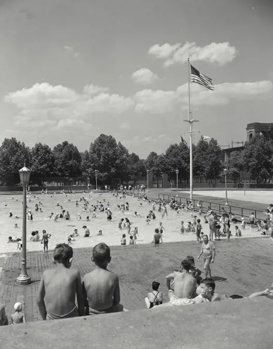 Vintage photograph. Astoria Park Pool. New York City. People playing in public pool