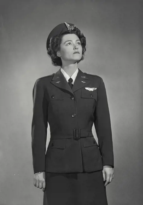 Vintage photograph. Woman in Woman's Air Force Service Pilot uniform