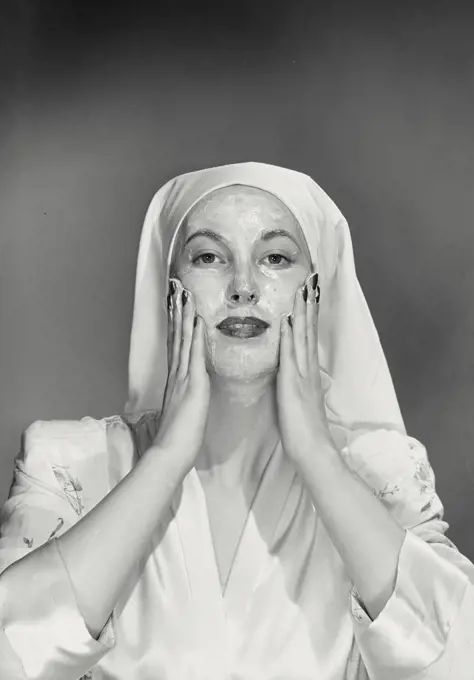 Vintage photograph. Woman washing her face