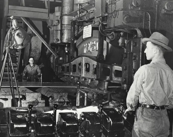 Workers working in a steel mill