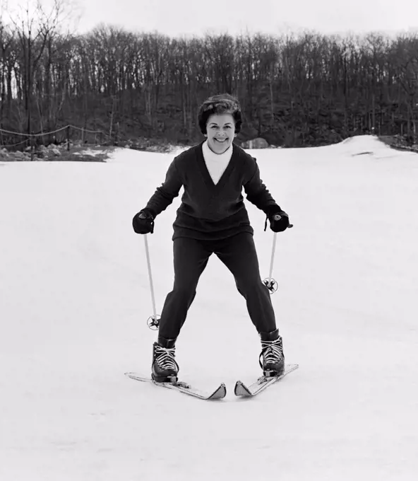Happy woman skiing