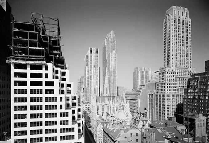 USA, New York State, New York City, view over rooftops toward Rockefeller Center and St. Patricks Cathedral from vicinity of Park Avenue