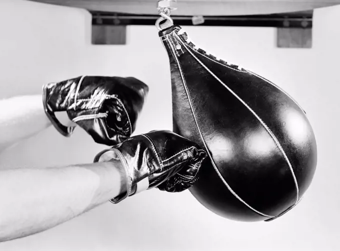 Boxer hitting punching bag