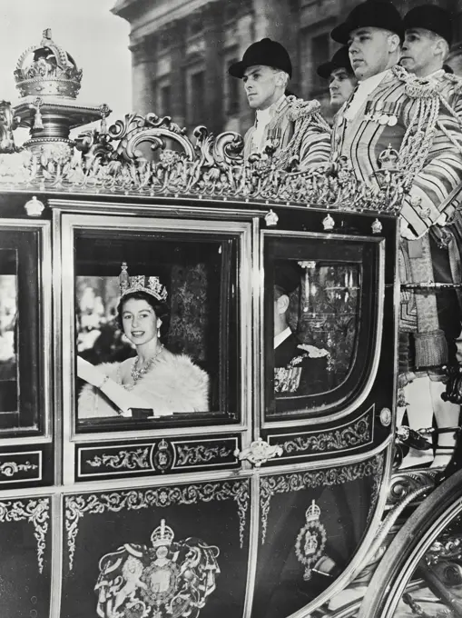 Vintage photograph. Her Majesty Queen Elizabeth II, with His Royal Highness the Duke of Edinburgh, as she left Buckingham Palace for the State Opening of Parliament in the Irish Free State Coach