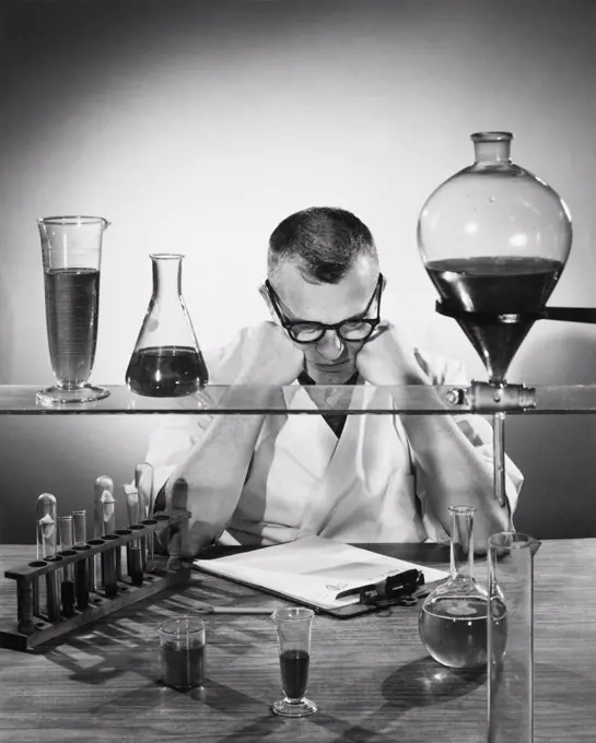 Scientist examining chemicals in a laboratory