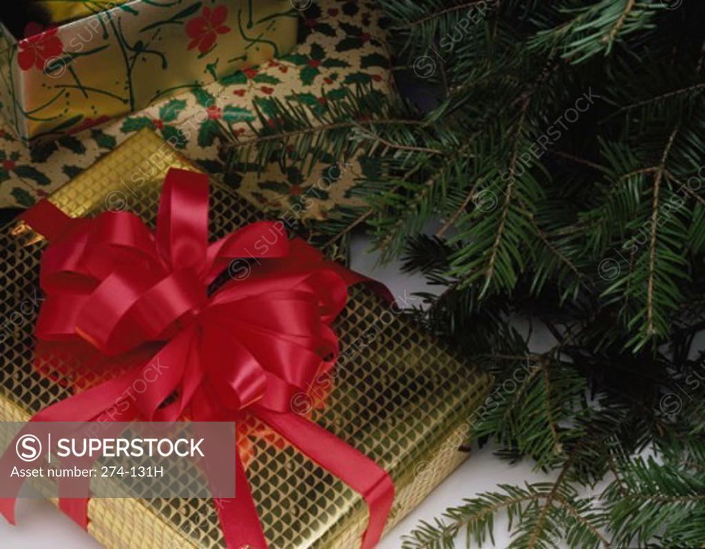 Stock Photo: 274-131H Close-up of a Christmas present under a Christmas tree