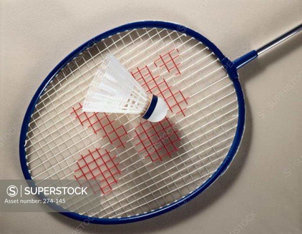 Stock Photo: 274-145 Close-up of a shuttlecock on a badminton racket