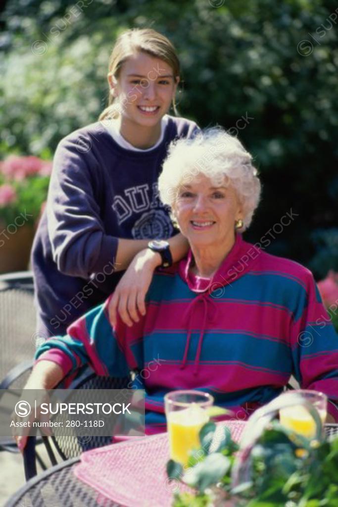 Stock Photo: 280-118D Senior woman with her granddaughter smiling