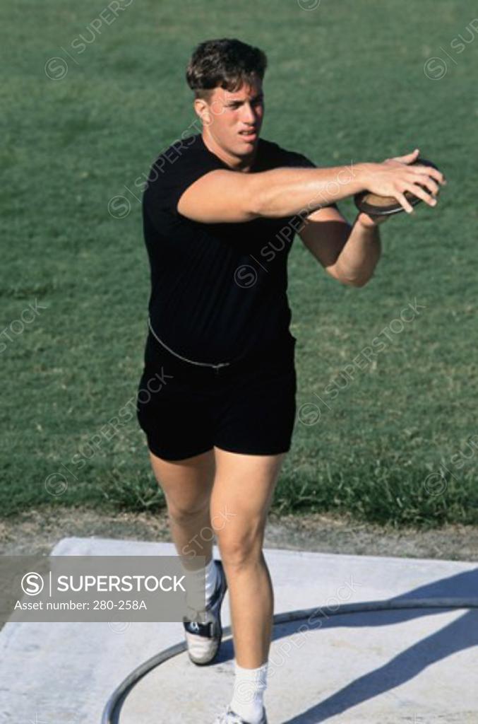 Stock Photo: 280-258A Athlete throwing a discus