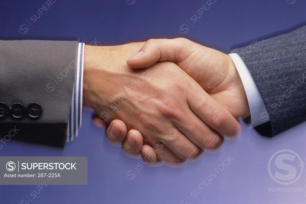 Stock Photo: 287-225A Two businessmen shaking hands
