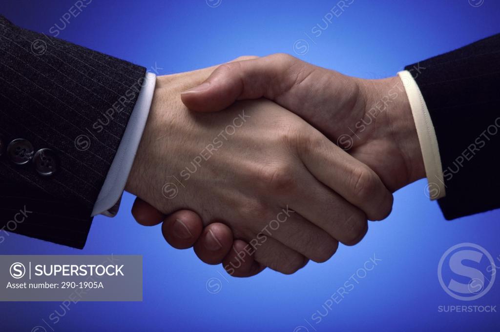 Stock Photo: 290-1905A Two businessmen shaking hands