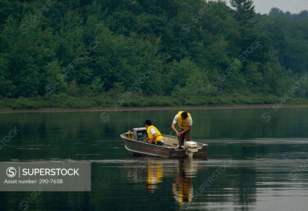 Stock Photo: 290-765B Scientists analyzing pollution level in a river, Chalk River Laboratories, Ottawa River, Canada