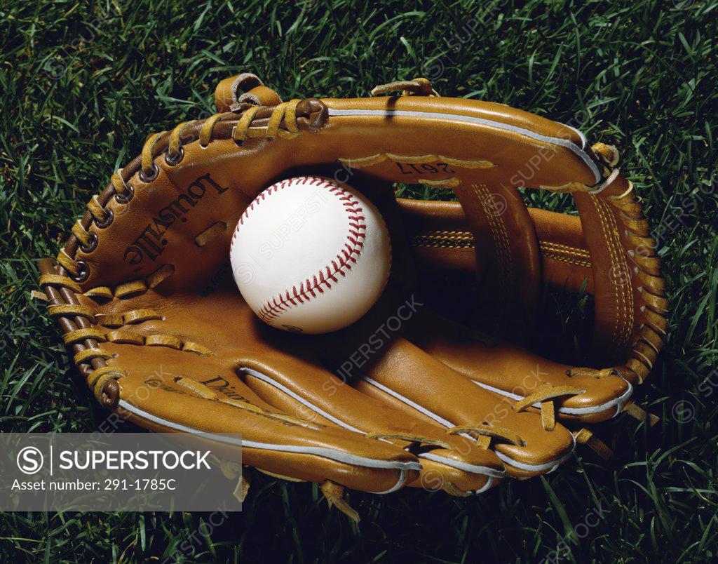 Stock Photo: 291-1785C Close-up of a baseball in a baseball glove