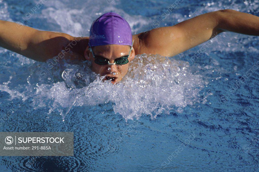 Stock Photo: 291-885A Close-up of a swimmer swimming in a swimming pool