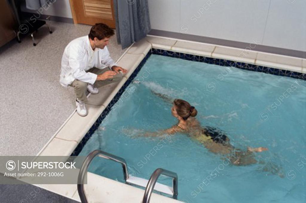 Stock Photo: 292-1006G High angle view of a doctor giving instructions to a patient
