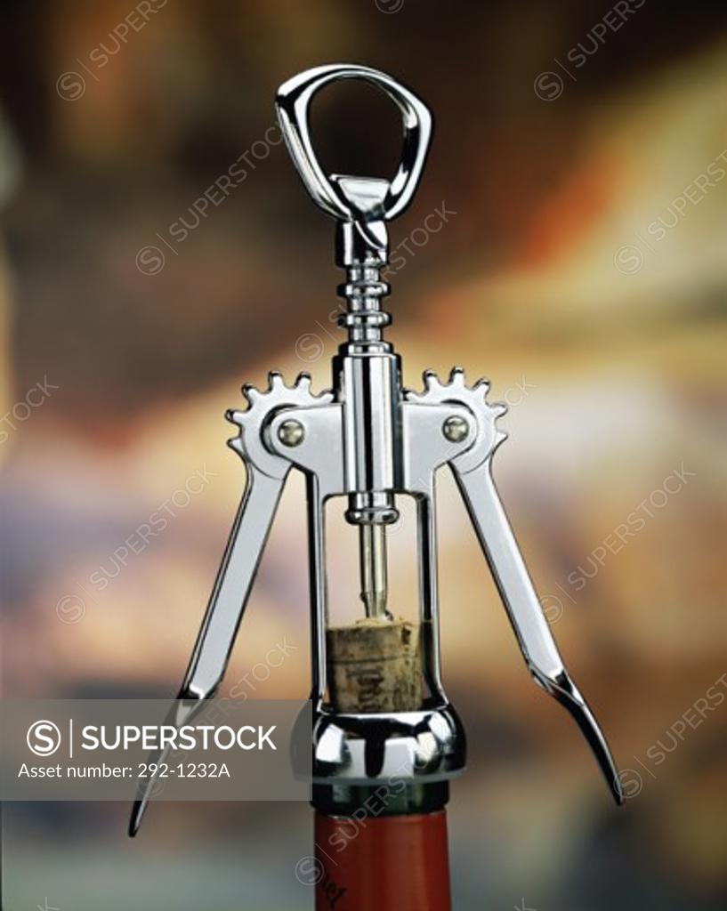Stock Photo: 292-1232A Close-up of a corkscrew on a wine bottle