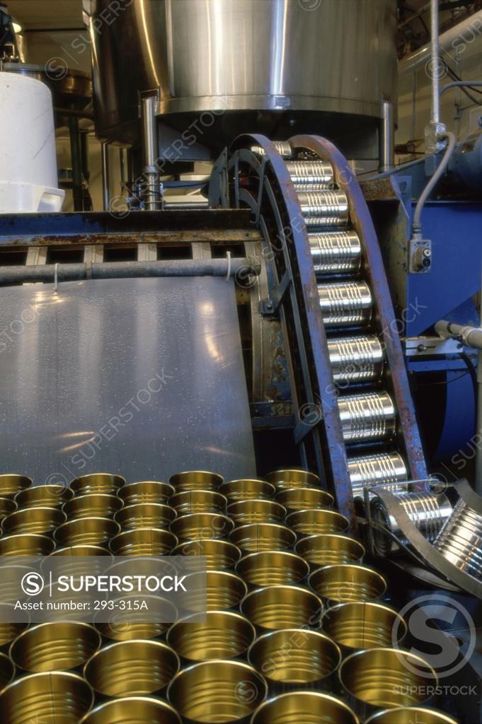 Stock Photo: 293-315A Cans on a conveyor belt in food processing plant