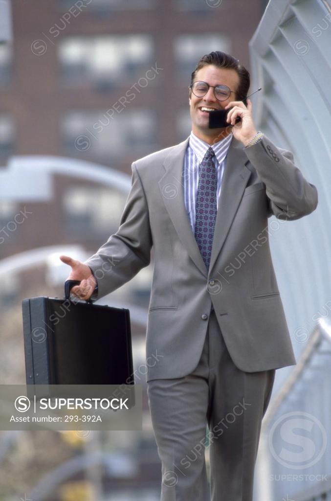 Stock Photo: 293-392A Businessman talking on a mobile phone