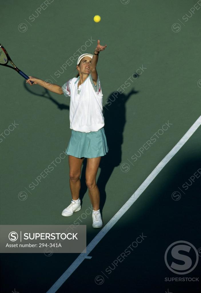 Stock Photo: 294-341A High angle view of a young woman playing tennis