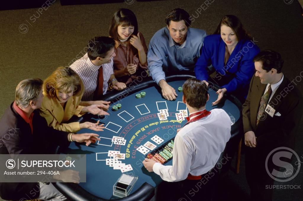 Stock Photo: 294-406A High angle view of a group of people playing blackjack in a casino