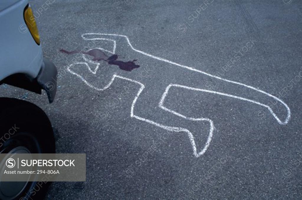 Stock Photo: 294-806A High angle view of the chalk outline of a human body on the road