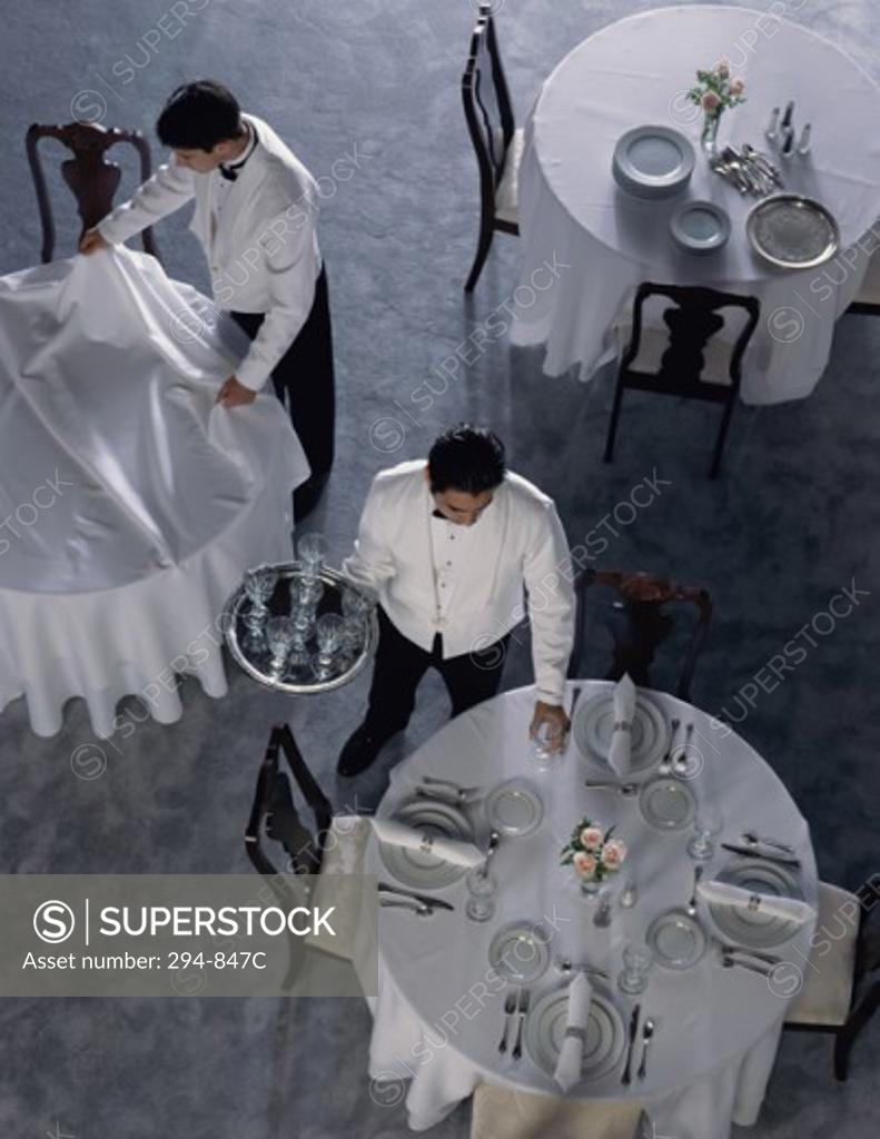 Stock Photo: 294-847C High angle view of two waiters working in a restaurant