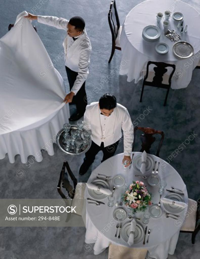 Stock Photo: 294-848E High angle view of two waiters working in a restaurant