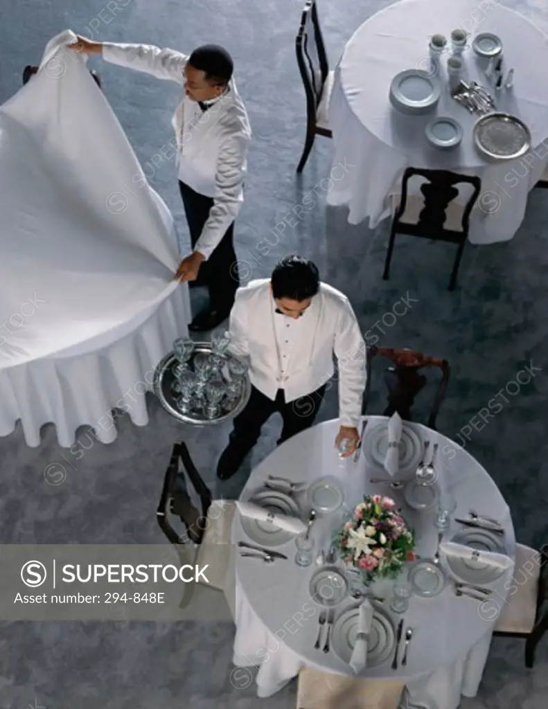 High angle view of two waiters working in a restaurant