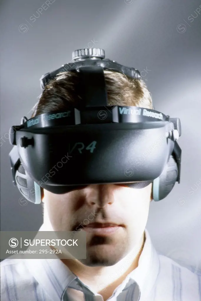Close-up of a mid adult man wearing Virtual Reality Simulator