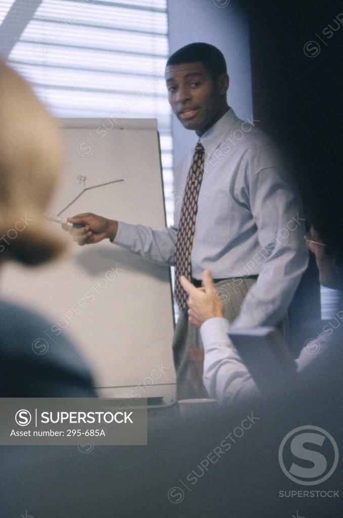 Stock Photo: 295-685A Businessman giving a presentation in an office