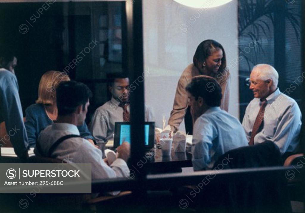 Stock Photo: 295-688C Business executives talking in a conference room